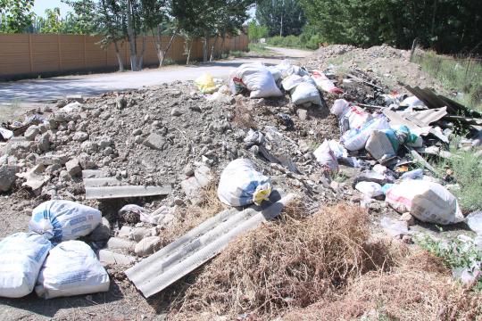 ҚАБРИСТОН  ЁНИДАГИ ЧИҚИНДИХОНА